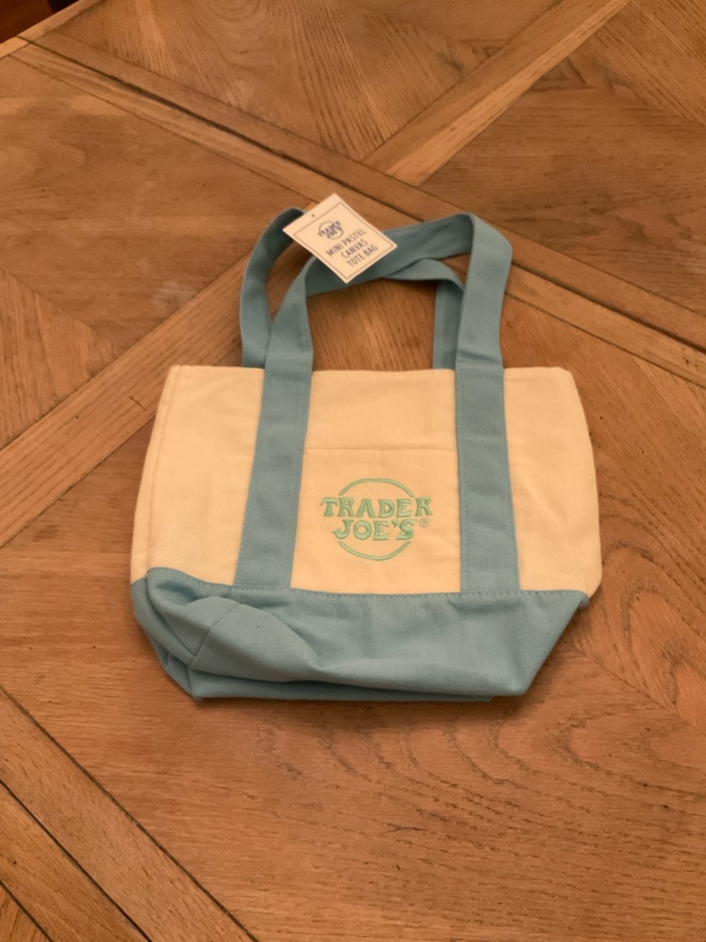 NWT. Trader Joe's Cream and Light Blue Canvas Tote
